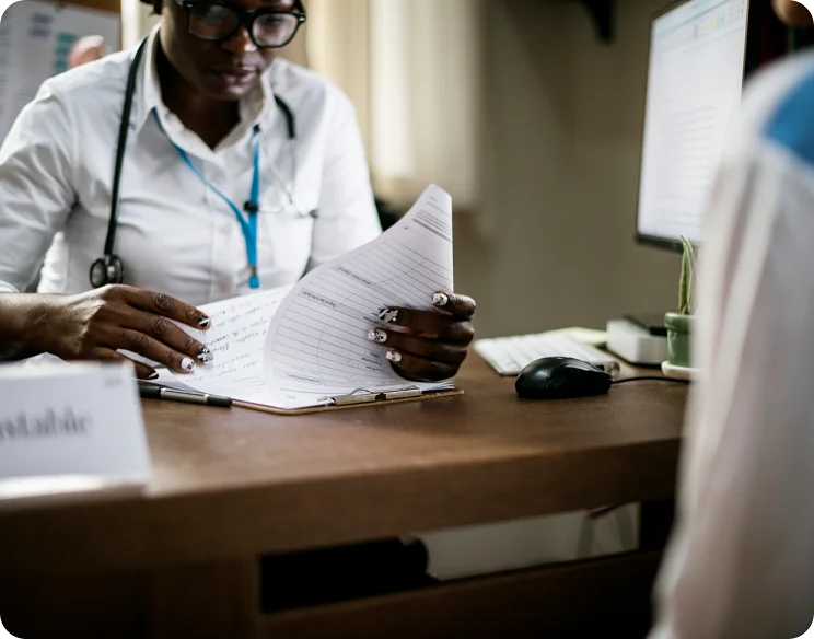 Clinician reviewing documents